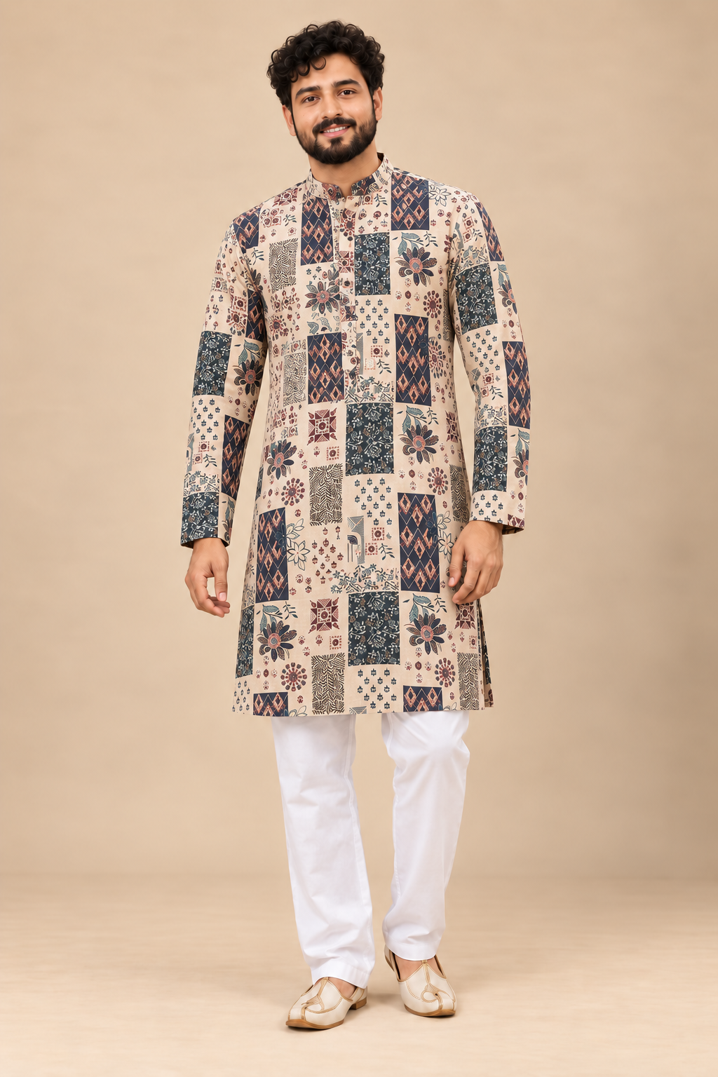 Indian model wearing cream and navy patchwork print kurta with white pajama on a beige background